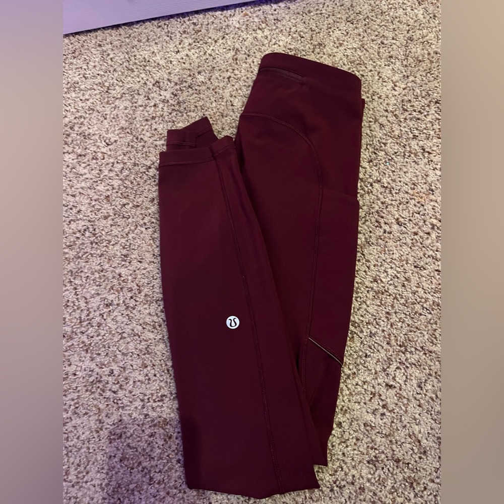 Lulu lemon maroon wunder train high rise with pockets
